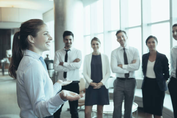 istock Successful Businesswoman and Team 953579162