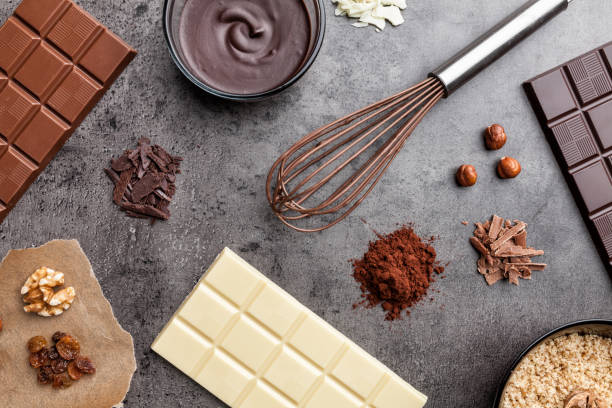 istock Delicious variety of chocole on rustic background 953582008