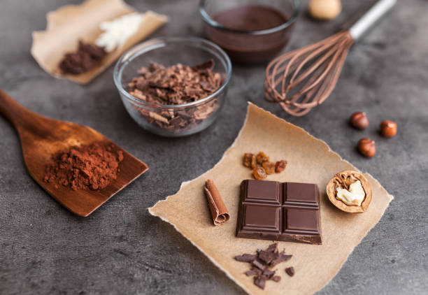 istock Delicious variety of chocole on rustic background 953582532