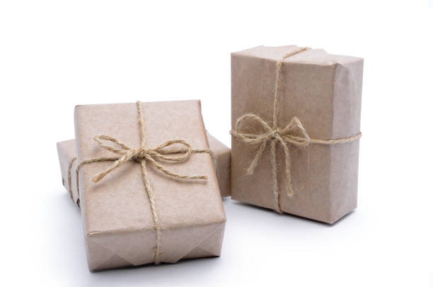 istock Boxes wrapped in wrapping paper on a white background. 953582684