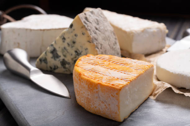 istock French cheeses plate in assortment, blue cheese, brie, munster, soft goat cheese 953586828