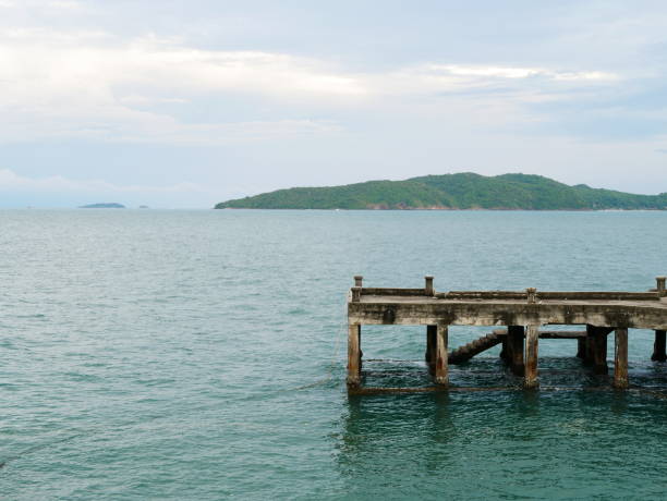 istock Concrete pier on the beach 953592708