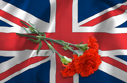 image of united kingdom flag and flowers close-up