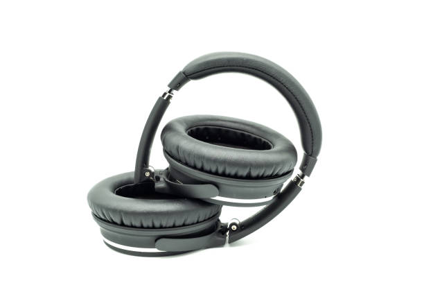 istock Modern Black Cushioned headphones on White Background 953605154