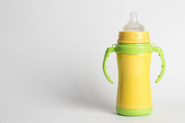 istock yellow thermos with pacifier for the child 953612808