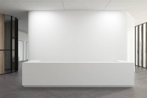 White reception in a white office lobby White reception desk standing in a white office corridor with a concrete floor. 3d rendering mock up receptionist stock pictures, royalty-free photos & images