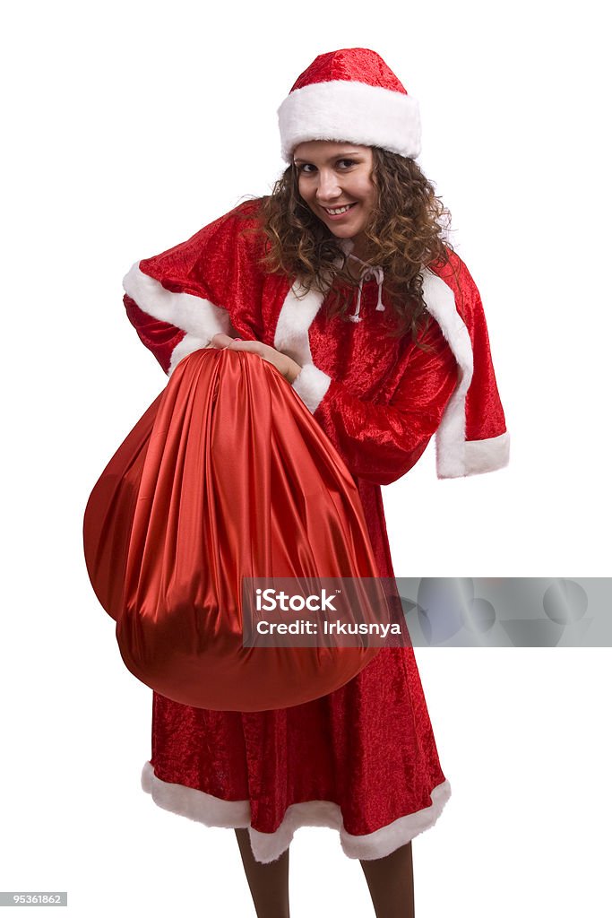 Santa woman is holding red sack with gifts.  Adult Stock Photo