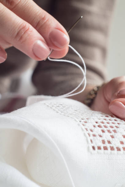 woman's hands embroider ornaments - embroider imagens e fotografias de stock