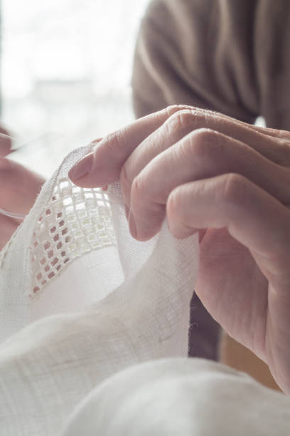 woman's hands embroider ornaments - embroider imagens e fotografias de stock