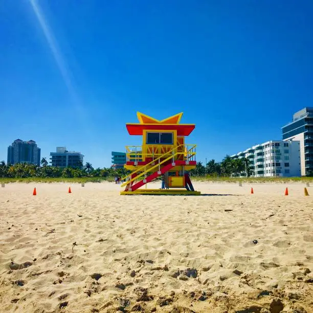 Sun shining on a Miami beach lifeguard hut
