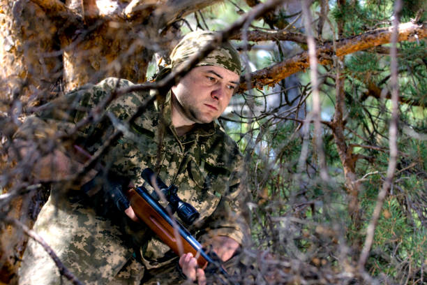 istock young man with an air rifle 953624610