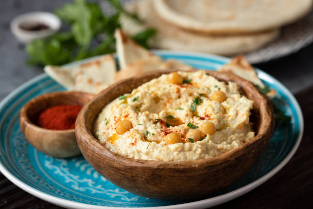 istock Traditional chickpea hummus in bowl 953628226