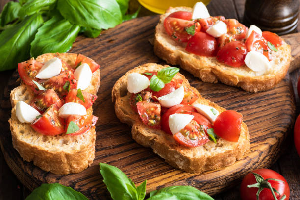 istock Italian Bruschetta or Crostini With Tomato Mozzarella Basil 953628312