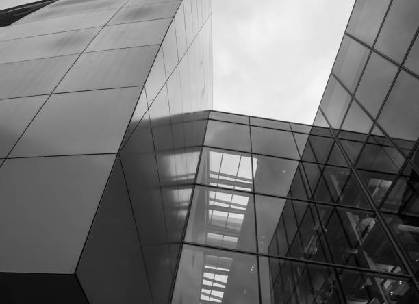 istock The glass architecture in city against a sky 953628724