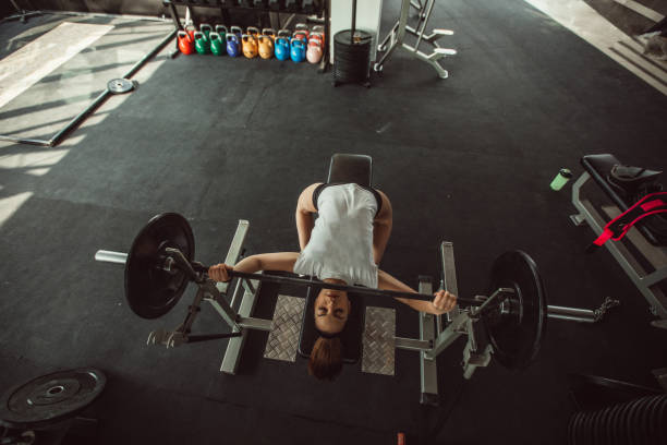 istock Woman weightlifting 953631818