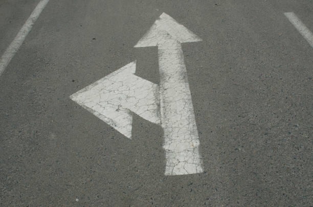istock Forward and left signs on the road 953633124