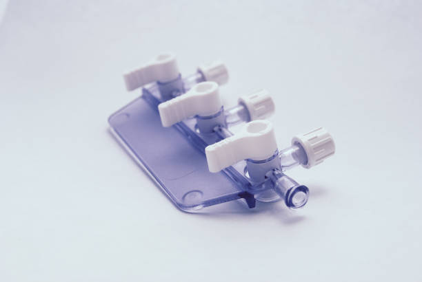 istock Medical converting device. Reducer part on a white background. Part of the system for intravenous infusions. Photo 953636816