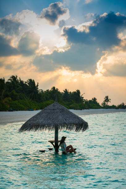 istock Young Woman Enjoying Vacations on Tropical Island 953637604