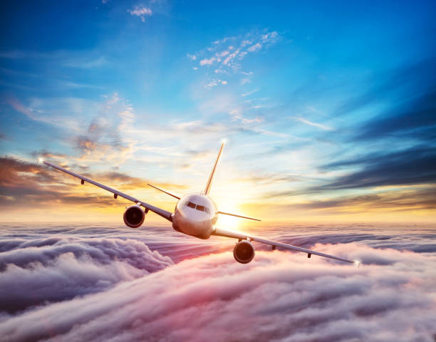 istock Passengers commercial airplane flying above clouds 953638328