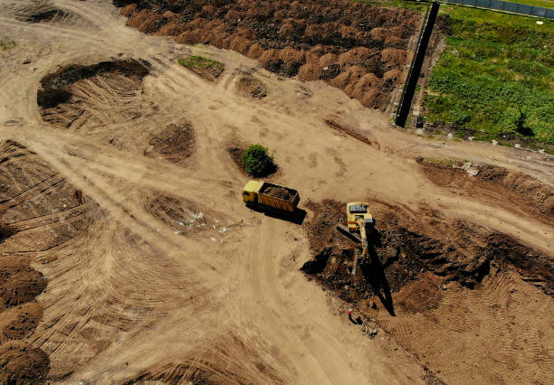 istock excavator works at the construction site 953639494
