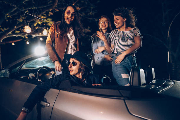istock Young people having party in convertible 953642622