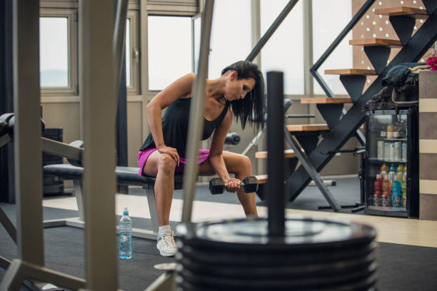 istock Woman exercise with dumbbell 953643766