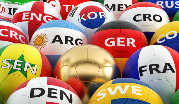 istock soccer balls colored in different national flag colors - 3D rendering 953650046