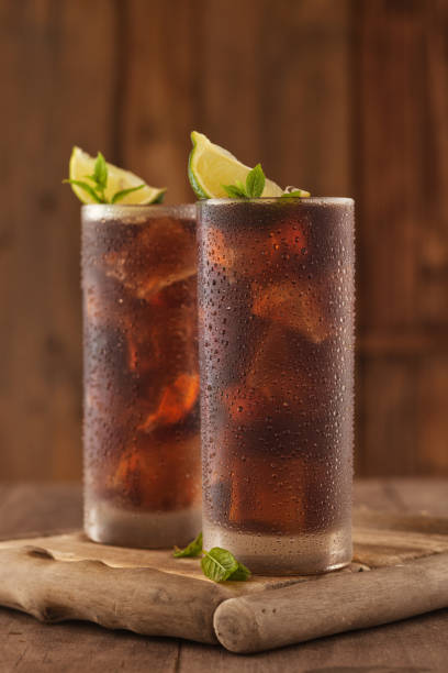 istock Glass of cola with ice. 953650166