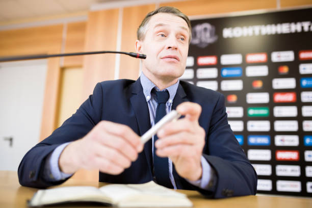 istock Mature Businessman Speaking  at Press Conference 953656956