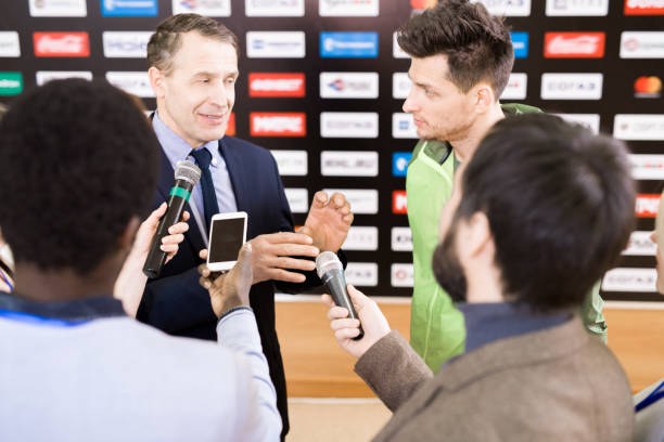 istock Businessman Talking to Press 953657004
