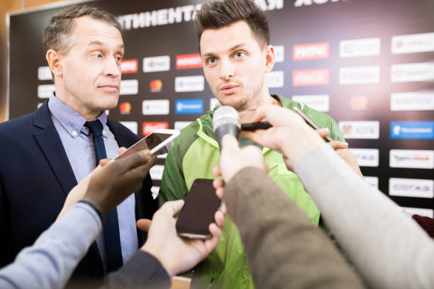 istock Reporters Interviewing Sportsman 953657024
