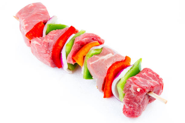 Low Carb Diet Beef and Veggie Shish Kebab Raw Ketogenic Diet beef shish kebab with red and green pepper, onion goodfood stock pictures, royalty-free photos & images