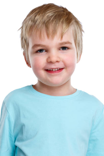 istock Child kid boy portrait smiling face isolated on white 953660124