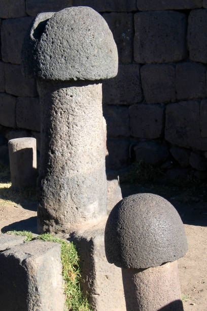 istock Ancient fertility statues (penises) in Pisac, Peru 953660922