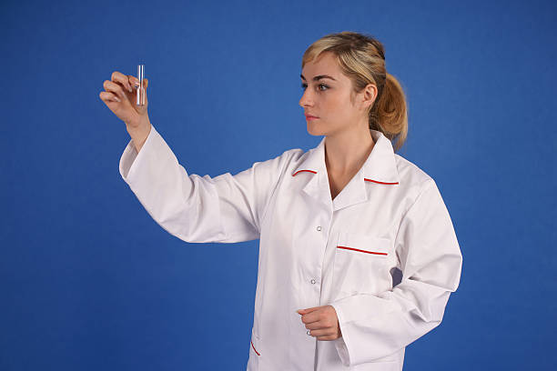 Researcher holding test tube stock photo