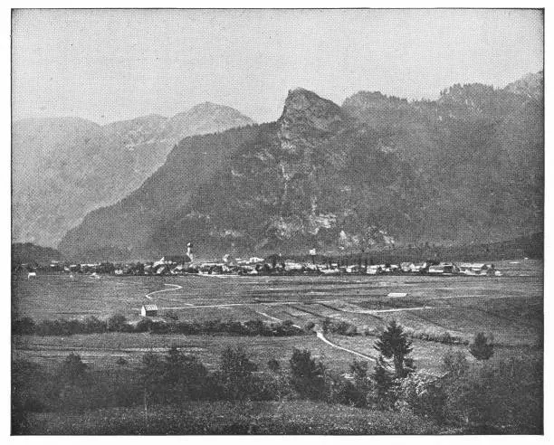 Kofel Mountain behind the town of Oberammergau, Germany. Vintage halftone circa late 19th century.