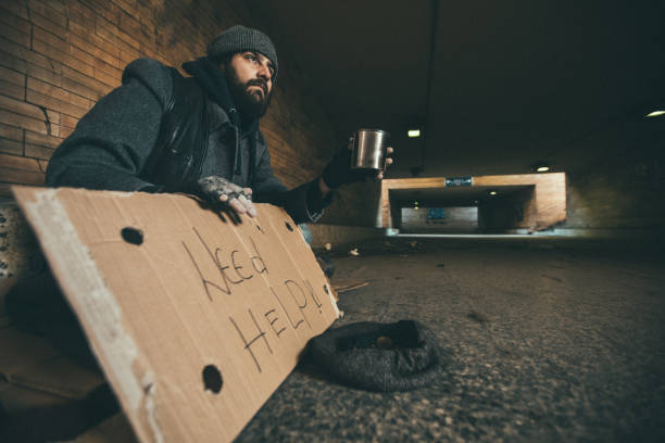 istock Adult man begging in tunnel 953665462
