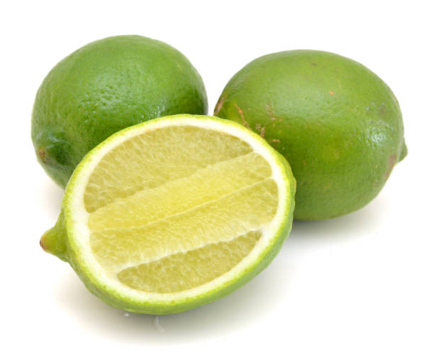 istock Fresh ripe lime isolated on white background 953669412