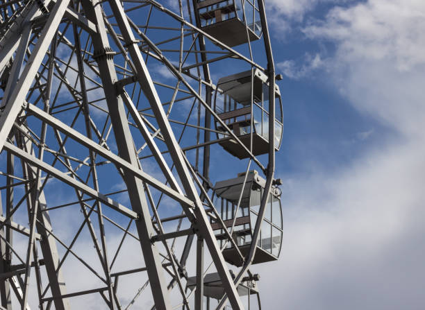 istock part of a ferris wheel against a blue sky 953669494