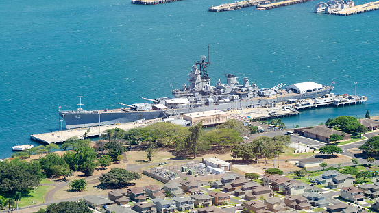 Aerial view of Battleship Missouri Memorial museum featuring the former USS Missouri berthed at Ford Island in Pearl Harbor, Oahu, Hawaii, USA.