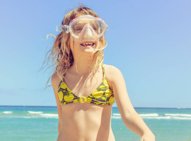 istock Snorkel Mask and the Girl 953674560