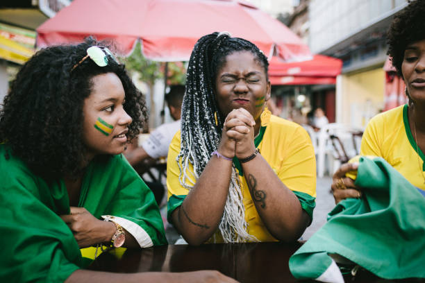 istock Friends cheering for Brazil's victory 953677814