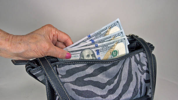 istock Cash in a Purse 953678696
