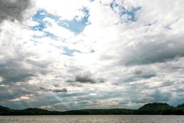 istock Sun in the golden hour over a lake 953686370
