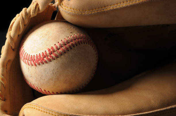 istock Baseball and Glove Close up 953686404