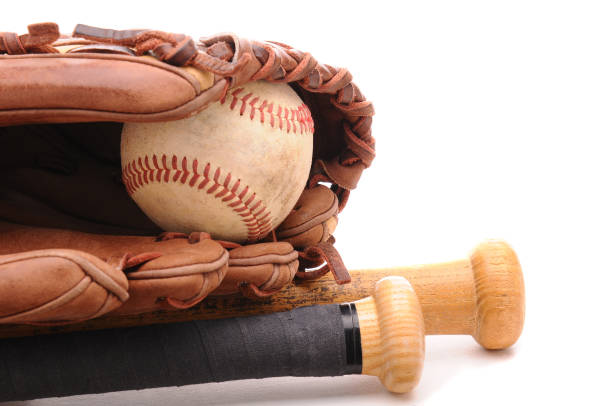 istock Baseball Glove ball and two bats on white with copyspace 953686412