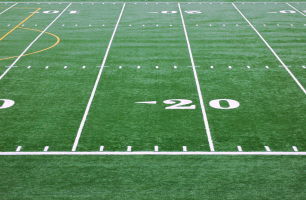 Football Stadium Artificial Turf Artificial Turf and yard markers at School Football Stadium artifical grass stock pictures, royalty-free photos & images