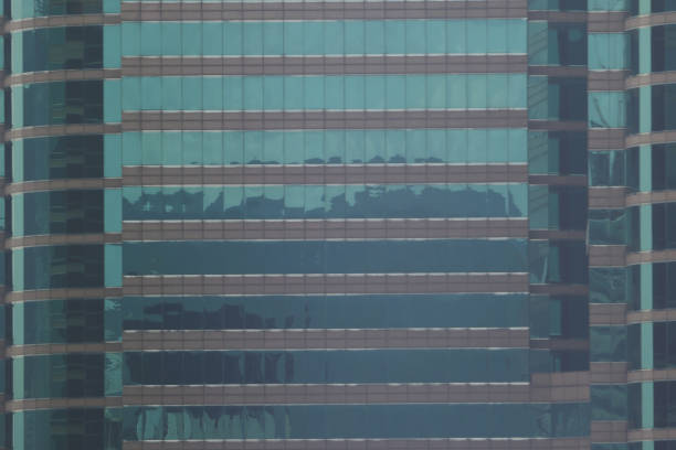 istock modern glass buildings in hong kong 953691046