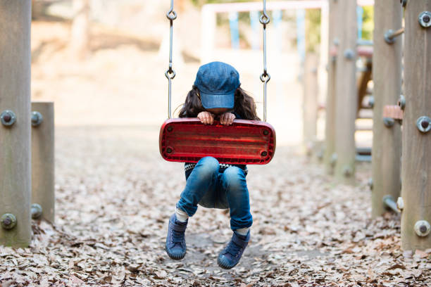 istock Little girl playing in the park 953703634