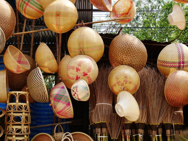 istock Bamboo wickerwork baskets on the thailand market place. Handmade from natural material. Bamboo handicraft products to maintain a traditional handicraft in a countryside. 953704404
